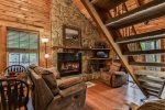 Cozy Living Room With A Wood Burning Fireplace